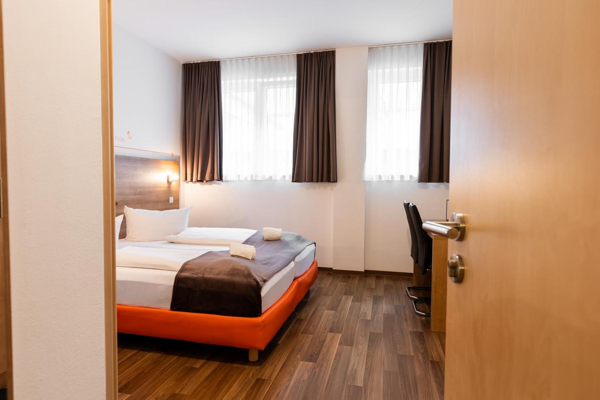 Orange Hotel Und Apartments Новый-Ульм Экстерьер фото